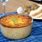 If you're sick of the same old corn side dish, try this recipe for Corn Pudding. This dish, with Native American origins is like a cross between creamed corn and a souffle. | www.curiouscuisiniere.com