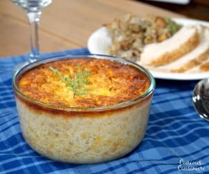 If you're sick of the same old corn side dish, try this recipe for Corn Pudding. This dish, with Native American origins is like a cross between creamed corn and a souffle. | www.curiouscuisiniere.com