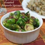 Slightly sweet, slightly salty this recipe for Maple Bacon Roasted Brussels Sprouts is sure to be a winning side dish on your holiday table or any day! | www.curiouscuisiniere.com