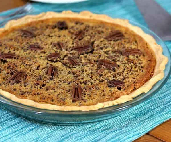 Sweet, sticky, and nutty, this recipe for Southern Pecan Pie Without Corn Syrup is just the way the dessert should be.