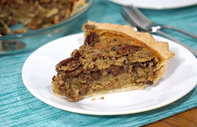 Sweet, sticky, and nutty, this recipe for Southern Pecan Pie Without Corn Syrup is just the way the dessert should be.