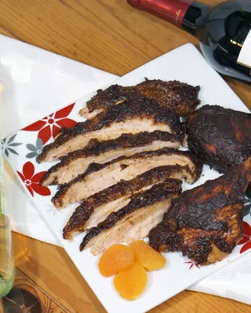 Change up your holiday dinner routine with this recipe for mole seasoned Roast Duck served with a rich Ancho and Apricot Mole Sauce. | www.curiouscuisiniere.com