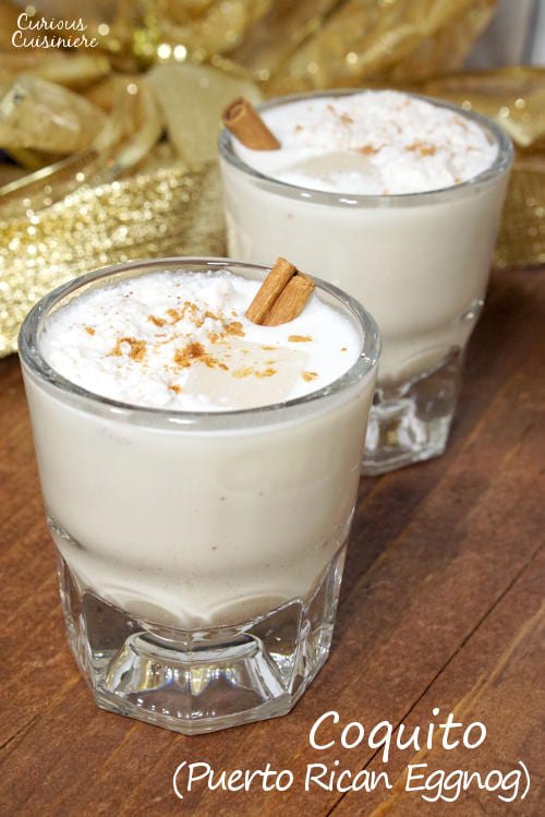 Rum and coconut milk give the Puerto Rican twist on eggnog a Caribbean flair. Smooth and creamy, this Coquito recipe is an easy drink to whip up for your holiday party guests! | www.curiouscuisiniere.com