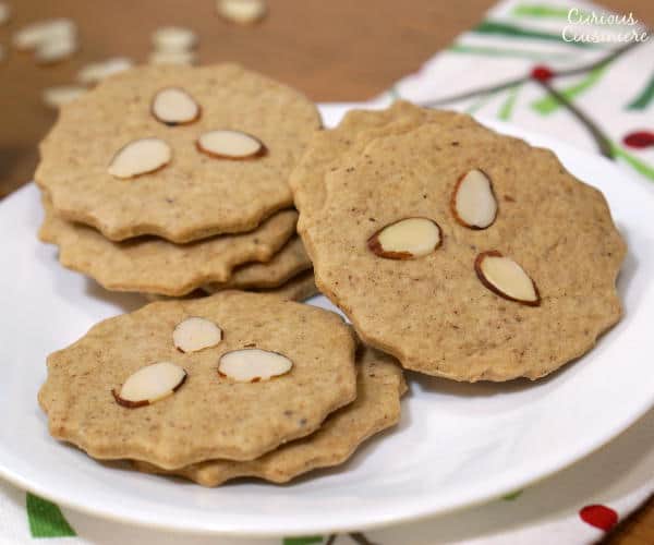 Also known as Dutch Windmill Cookies, our Speculaas (or Speculoos) might not be in the shape of windmills, but they still bring the same crisp, spiced cookie flavor of the traditional Christmas recipe. | www.curiouscuisiniere.com