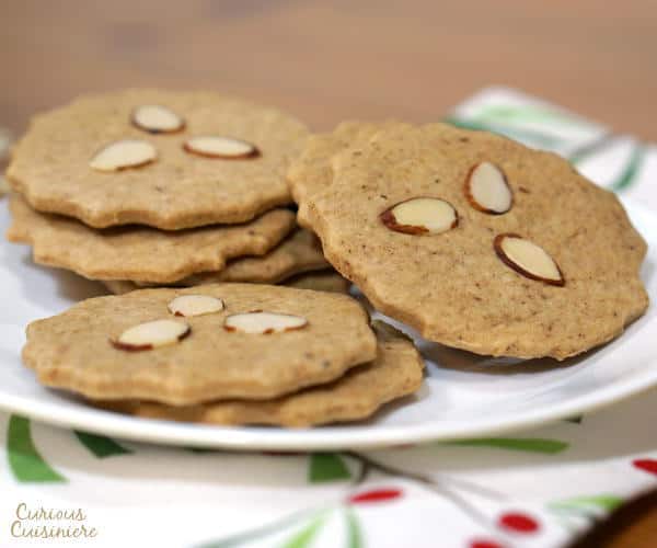 Also known as Dutch Windmill Cookies, our Speculaas (or Speculoos) might not be in the shape of windmills, but they still bring the same crisp, spiced cookie flavor of the traditional Christmas recipe. | www.curiouscuisiniere.com