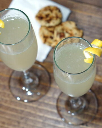 With a fun play of sweet, sour, and bubbles, this recipe for a French 75 cocktail is perfect for any celebration! | www.curiouscuisiniere.com