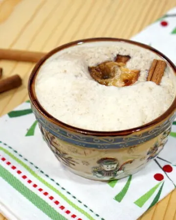 This Wassail Recipe follows the traditional method for making wassail, a warm, spiked, apple cider punch that was (and still is) traditionally served during holiday celebrations. | www.curiouscuisiniere.com