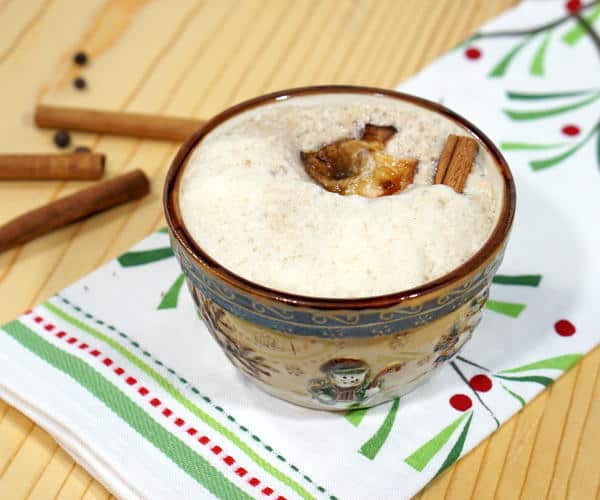 This Wassail Recipe follows the traditional method for making wassail, a warm, spiked, apple cider punch that was (and still is) traditionally served during holiday celebrations. | www.curiouscuisiniere.com