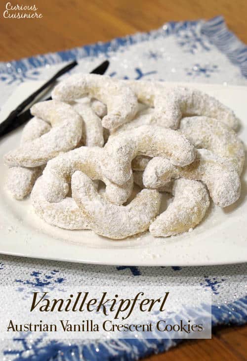 Crisp and buttery with a nutty, almond flavor, this recipe for delicate Vanillekipferl, or Austrian Vanilla Crescent Cookies, creates cookies that look pretty on a platter and are sure to be a hit at your holiday party. www.curiouscuisiniere.com