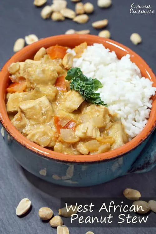 West African Peanut Stew brings tender chicken and earthy, nutty peanuts together in one flavorful and comforting dinner recipe. | www.curiouscuisiniere.com