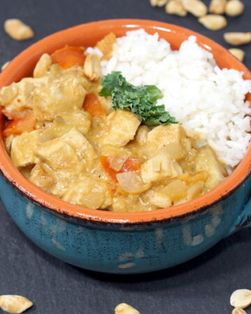 West African Peanut Stew brings tender chicken and earthy, nutty peanuts together in one flavorful and comforting soup recipe. | www.curiouscuisiniere.com