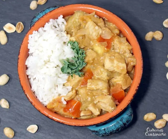 West African Peanut Stew brings tender chicken and earthy, nutty peanuts together in one flavorful and comforting dinner recipe. | www.curiouscuisiniere.com 
