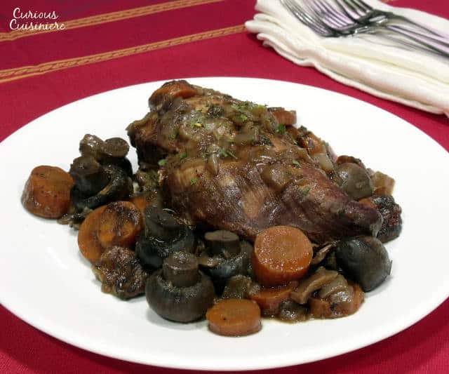 Coq Au Vin Slow Cooker style brings cook while-you're-away ease to the classic French wine braised chicken dish. | www.curiouscuisiniere.com