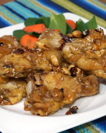 Dak Kang Jung, or Korean Sweet and Spicy Chicken Wings are the perfect combo of sticky sweetness and red chili spice, this recipe is perfect for your game day appetizer! | www.CuriousCuisiniere.com