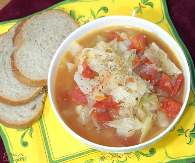 Shchi uses beef broth for a rich and robust flavor, making this Russian version different from other Cabbage Soup recipes. | www.curiouscuisiniere.com 