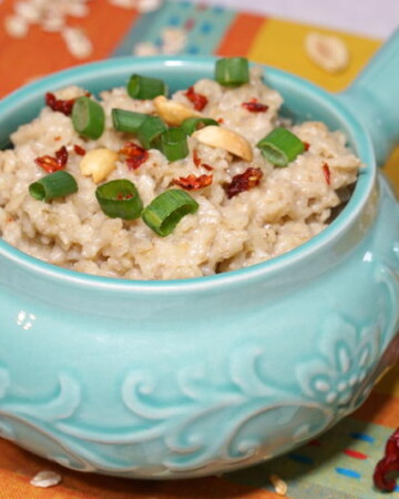 Morning oats don't have to be sweet, this Spicy Thai Peanut Savory Oatmeal Bowl brings savory Thai peanut flavors and a hint of spice together for a fun way to kick start your day. | www.CuriousCuisiniere.com