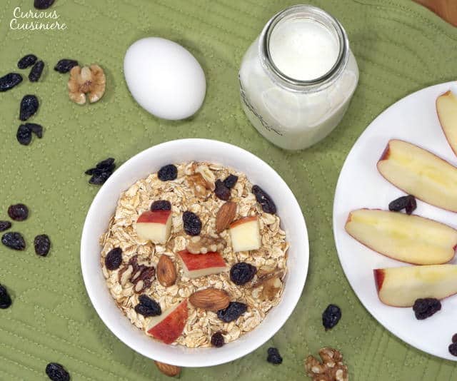 This Swiss Muesli Recipe brings protein-packed toasted, nutty goodness to breakfast. Serve it with a cup of milk and a hard boiled egg for a protein rich way to start your day. | www.CuriousCuisiniere.com 