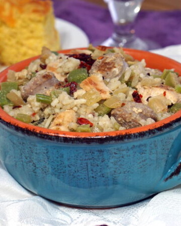 Cajun Chicken and Sausage Jambalaya is a smoky and flavorful one pot meal. Whether you like it spicy or mild, this recipe is sure to a favorite for family dinners and parties. | www.CuriousCuisiniere.com