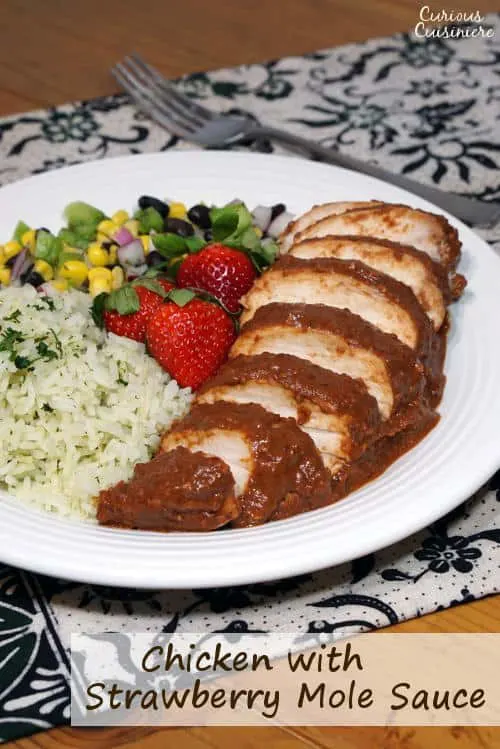 Light and bright strawberries take on a savory depth in this recipe for Chicken with Strawberry Mole Sauce. If you love mole and strawberries, you need to try this unique twist on the classic Mexican mole. | www.CuriousCuisiniere.com 