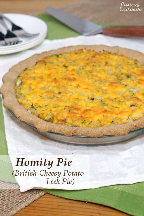 British Homity Pie brings the cheesy potato goodness of a loaded baked potato together with a hearty whole wheat crust. It is the perfect recipe for an easy, vegetarian dinner. | www.CuriousCuisiniere.com