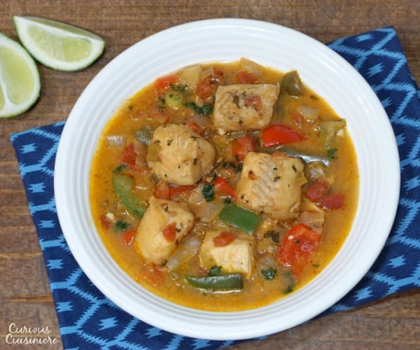 A light and tropical fish stew, Moqueca brings coconut milk and citrus together in a tasty Brazilian dinner recipe. | www.CuriousCuisiniere