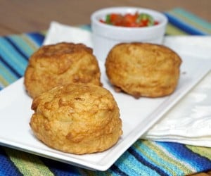 The Colombian version of Papas Rellenas stuffs a flavorful beef and rice mixture inside a creamy, mashed potato shell that is fried to golden brown. | www.CuriousCuisiniere.com