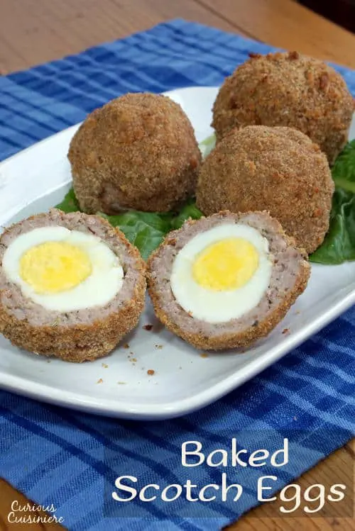 Avoid the deep fryer with these Baked Scotch Eggs, this easy recipe is perfect for a fun lunch or picnic. | www.CuriousCuisiniere.com