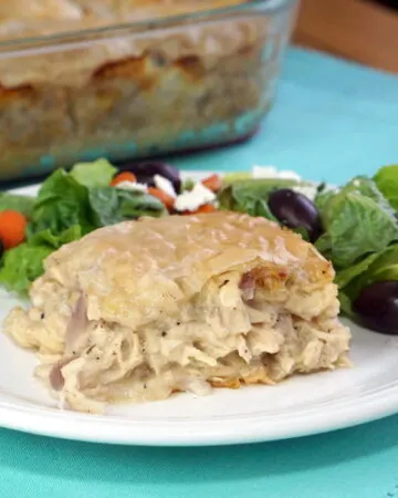 Think of Kotopita like the Greek version of a Chicken Pot Pie. With a flaky filo crust and feta cheese, this recipe is sure to be a family favorite. | www.CuriousCuisiniere.com