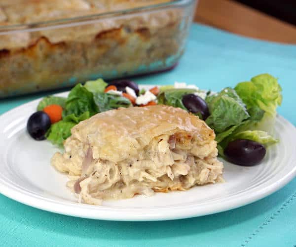 Think of Kotopita like the Greek version of a Chicken Pot Pie. With a flaky filo crust and feta cheese, this recipe is sure to be a family favorite. | www.CuriousCuisiniere.com