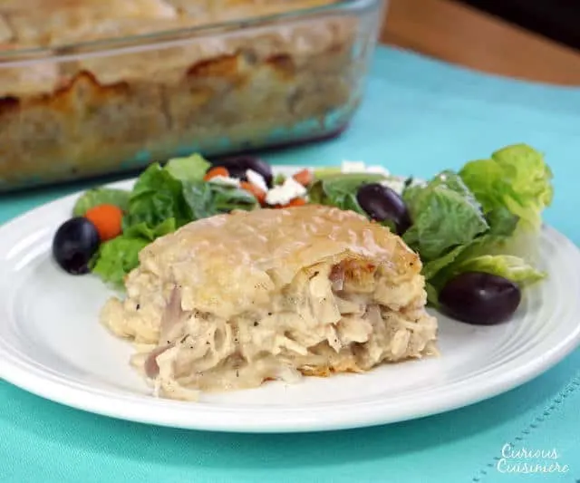 Think of Kotopita like the Greek version of a Chicken Pot Pie. With a flaky filo crust and feta cheese, this recipe is sure to be a family favorite. | www.CuriousCuisiniere.com