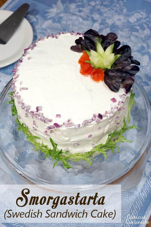 A Swedish Sandwich Cake is the perfect centerpiece for a spring party. Bright, fresh, and fun to prepare, make this recipe for your next picnic! | www.CuriousCuisiniere.com