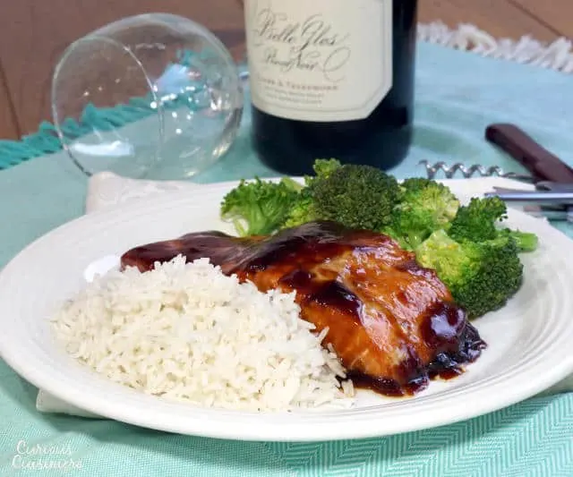 This easy Teriyaki Salmon recipe uses ingredients in your pantry to create an elegant dinner that is quick enough for a weeknight. | www.CuriousCuisiniere.com