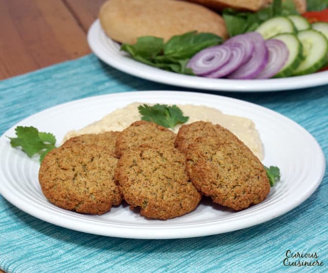 Baked Falafel gives you all the healthy, nutty falafel goodness without the hassle or added fat of frying, and it's just as good for stuffing into a pita! | www.CuriousCuisiniere.com
