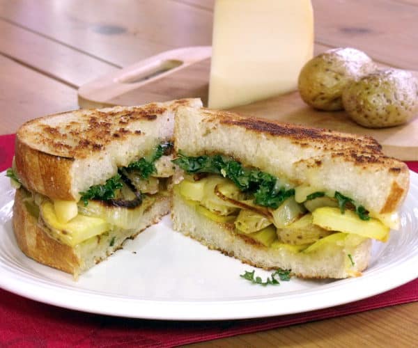 A Swiss Raclette cheese dinner meets a classic, American sandwich in this Grilled Raclette Cheese Sandwich recipe. Add a twist to your classic grilled cheese with this taste of the Alps! | www.CuriousCuisiniere.com