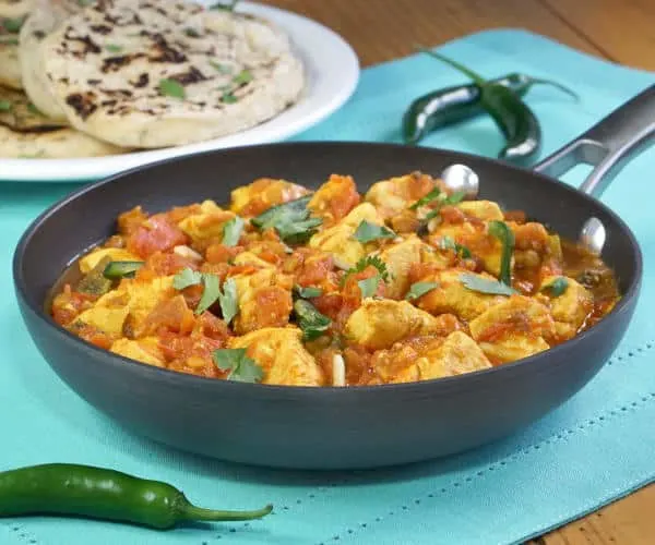 Grab some Naan, Chicken Karahi is a fragrant Pakistani Chicken Curry that will have you wanting to savor every last bite! | www.CuriousCuisiniere.com