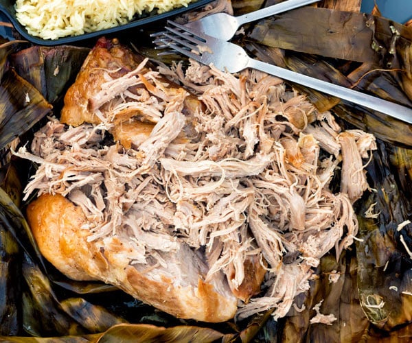 Hawaiian Kalua pork pulled on a banana leaf horizontal