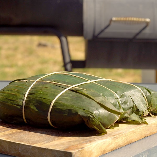 Hawaiian Kalua pork wrapped in banana leaves ready for the smoker