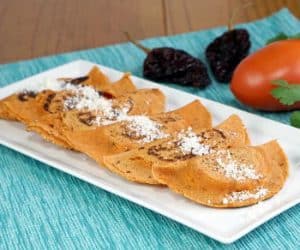 They might not look like "classic" enchiladas, but the chili-seasoned dough of these Enchiladas Potosinas makes them a unique and tasty treat. | www.CuriousCuisiniere.com