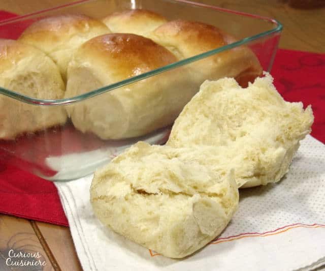 Our Hawaiian Sweet Rolls recipe makes light and fluffy dinner rolls that are slightly sweet and perfect for eating alone or stuffing with your favorite sandwich filling. | www.CuriousCuisiniere.com