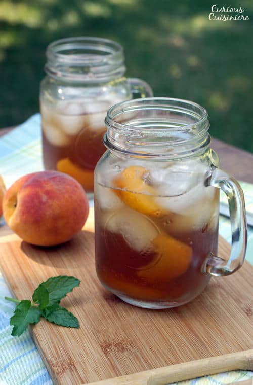 This lightly sweet Vietnamese Peach Tea is made with real peaches for a perfectly refreshing summer drink! | www.CuriousCuisiniere.com