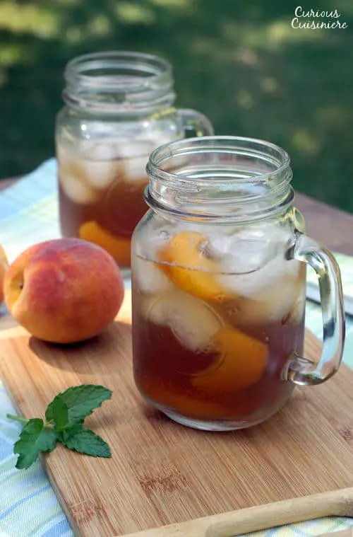 This lightly sweet Vietnamese Peach Tea is made with real peaches for a perfectly refreshing summer drink! | www.CuriousCuisiniere.com