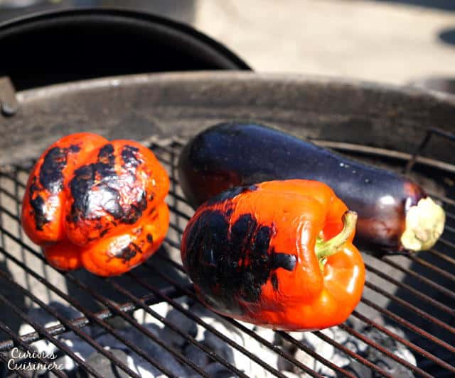 Get ready to fall in love with grill-roasted red peppers. One bite of Ajvar, and you will want to put this Serbian red pepper relish on everything from bread to meat and even veggies!| www.CuriousCuisiniere.com