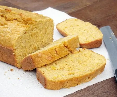 Kernels of sweet corn stud this sweet and flavorful Mealie Bread, a South African sweetcorn bread that is sure to delight any cornbread fan. | www.CuriousCuisiniere.com