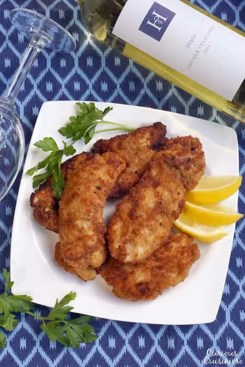 Give fried chicken an Austrian flair with easy to make Backhendl. If you love Schnitzel, this Austrian fried chicken will soon become a favorite too! | www.CuriousCuisiniere.com 