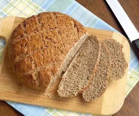If you love hearty rye bread, Bauernbrot is for you! This German farmer's bread brings authentic flavor and texture together in one easy to make loaf. | www.CuriousCuisiniere.com