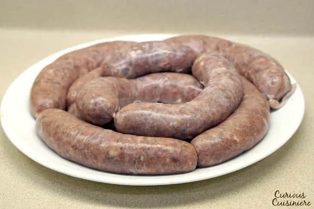 Don't let homemade sausage intimidate you. If you've ever wanted to make your own German Bratwurst, this easy Homemade Bratwurst recipe is for you! | www.CuriousCuisiniere.com