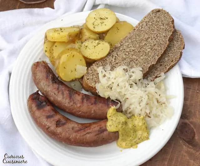 Don't let homemade sausage intimidate you. If you've ever wanted to make your own German Bratwurst, this easy Homemade Bratwurst recipe is for you! | www.CuriousCuisiniere.com