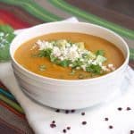 Locro de Papa is a Cheesy Ecuadorian potato soup that is the perfect fall or winter soup for a cool evening. | www.CuriousCuisiniere.com