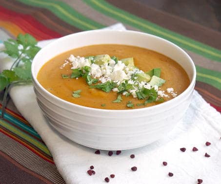 Locro de Papa is a Cheesy Ecuadorian potato soup that is the perfect fall or winter soup for a cool evening. | www.CuriousCuisiniere.com