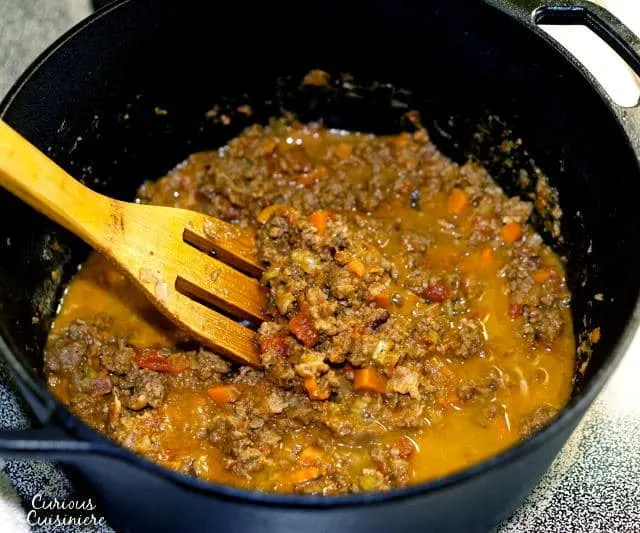 Authentic Bolognese Sauce is a hearty and flavorful meat sauce that is the perfect recipe for Italian comfort food! | www.CuriousCuisiniere.com